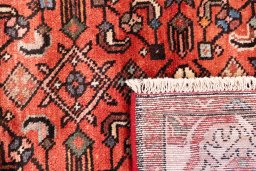 Close-up detail of 1997s Hoseinabad rug from Iran / Persia showing Wool weave