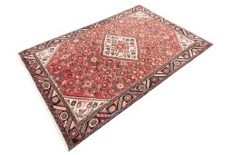 Corner detail of 1970s Hoseinabad rug showing border pattern and Wool pile