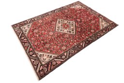 Close-up detail of 1970s Hoseinabad rug from Iran / Persia showing Wool weave
