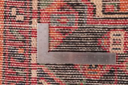 Close-up detail of 1970s Hoseinabad rug from Iran / Persia showing Wool weave