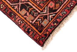 Central medallion detail of 1970s Hoseinabad rug from Iran / Persia