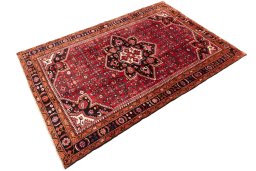 Close-up detail of 1980s Hoseinabad rug from Iran / Persia showing Wool weave