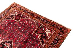 Surface texture of 1980s Hoseinabad rug with natural Wool and intricate pattern