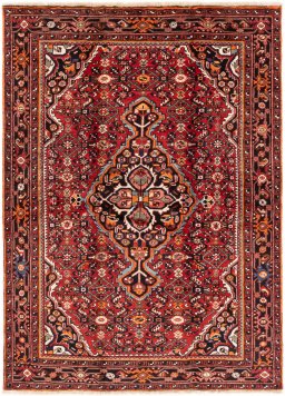 Full view of 1988s Hoseinabad rug from Iran / Persia, 216 × 160 cm in Red tones