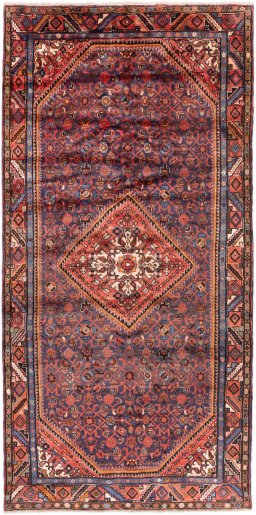 Full view of 1974s Hoseinabad rug from Iran / Persia, 323 × 158 cm in Dark blue tones