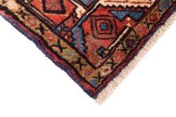 Central medallion detail of 1974s Hoseinabad rug from Iran / Persia