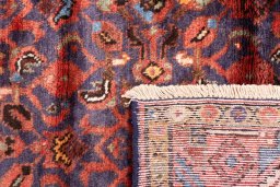 Close-up detail of 1974s Hoseinabad rug from Iran / Persia showing Wool weave