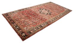 Close-up detail of 1990s Hoseinabad rug from Iran / Persia showing Wool weave