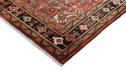 Backside of handmade 1990s Hoseinabad rug showing knot structure and weave density