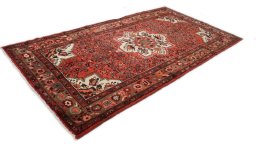 Close-up detail of 2000s Hoseinabad rug from Iran / Persia showing Wool weave
