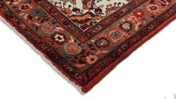 Backside of handmade 2000s Hoseinabad rug showing knot structure and weave density