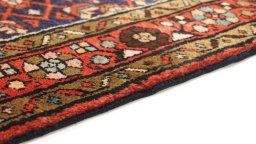 Central medallion detail of 2000s Hoseinabad rug from Iran / Persia