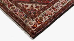 Backside of handmade 2000s Hoseinabad rug showing knot structure and weave density