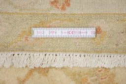 Corner detail of 1980s Isfahan rug showing border pattern and Wool pile