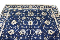Surface texture of 1980s Isfahan rug with natural Wool and intricate pattern