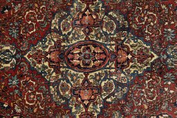 Central medallion detail of 1900s Isfahan rug from Iran / Persia