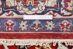 Corner detail of 1930s Isfahan rug showing border pattern and Wool pile