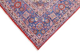 Backside of handmade 1930s Isfahan rug showing knot structure and weave density