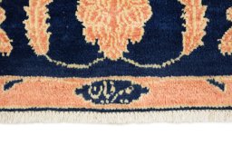 Backside of handmade 1980s Isfahan rug showing knot structure and weave density