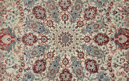 Central medallion detail of New Isfahan rug from China