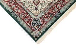 Backside of handmade New Isfahan rug showing knot structure and weave density