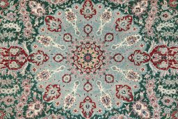 Central medallion detail of New Isfahan rug from China