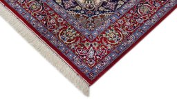 Backside of handmade New Isfahan rug showing knot structure and weave density