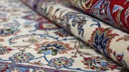 Close-up detail of New Isfahan rug from Iran / Persia showing Wool weave