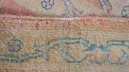 Corner detail of New Isfahan rug showing border pattern and Wool pile