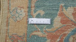 Corner detail of New Isfahan rug showing border pattern and Wool pile