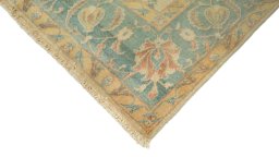 Backside of handmade New Isfahan rug showing knot structure and weave density