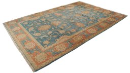 Corner detail of New Isfahan rug showing border pattern and Wool pile