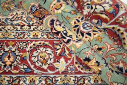 Corner detail of 1990s Isfahan rug showing border pattern and Wool pile