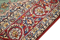 Close-up detail of 1990s Isfahan rug from Iran / Persia showing Wool weave