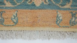 Close-up detail of New Isfahan rug from Iran / Persia showing Wool weave