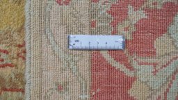 Corner detail of New Isfahan rug showing border pattern and Wool pile