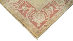 Backside of handmade New Isfahan rug showing knot structure and weave density