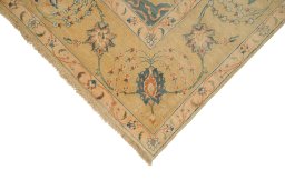 Backside of handmade New Isfahan rug showing knot structure and weave density