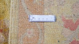 Corner detail of New Isfahan rug showing border pattern and Wool pile