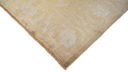 Backside of handmade New Isfahan rug showing knot structure and weave density