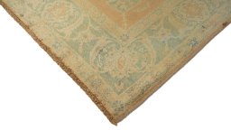 Backside of handmade New Isfahan rug showing knot structure and weave density