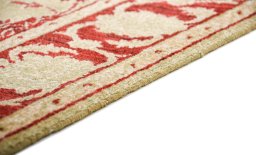 Backside of handmade New Isfahan rug showing knot structure and weave density