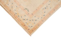 Backside of handmade New Isfahan rug showing knot structure and weave density