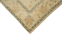 Backside of handmade New Isfahan rug showing knot structure and weave density