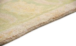 Backside of handmade New Isfahan rug showing knot structure and weave density