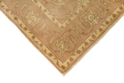 Backside of handmade New Isfahan rug showing knot structure and weave density