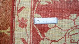 Close-up detail of New Isfahan rug from Iran / Persia showing Wool weave
