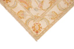 Backside of handmade New Isfahan rug showing knot structure and weave density