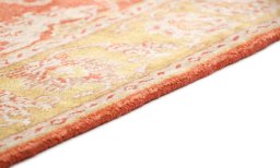 Backside of handmade New Isfahan rug showing knot structure and weave density