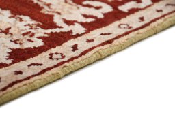 Backside of handmade New Isfahan rug showing knot structure and weave density